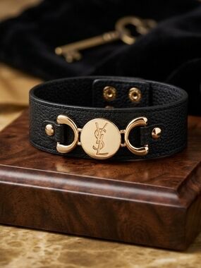 The NEW Boutique Black Leather Cuff with Gold Medallion Hardware